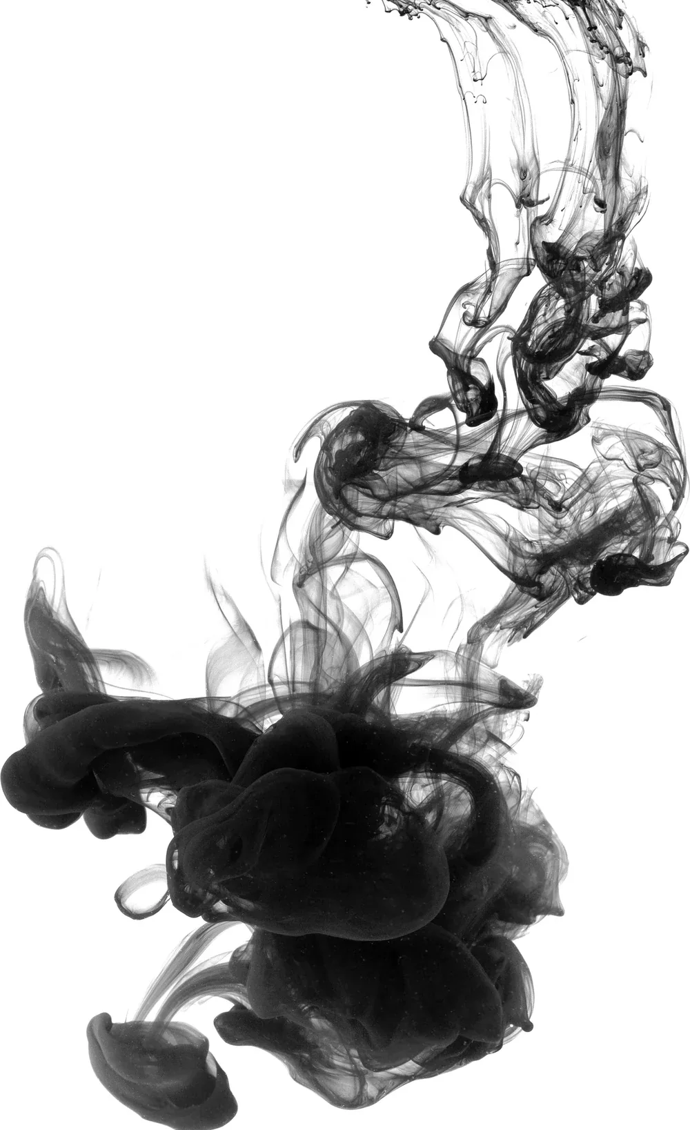 Black ink drifting through clear water